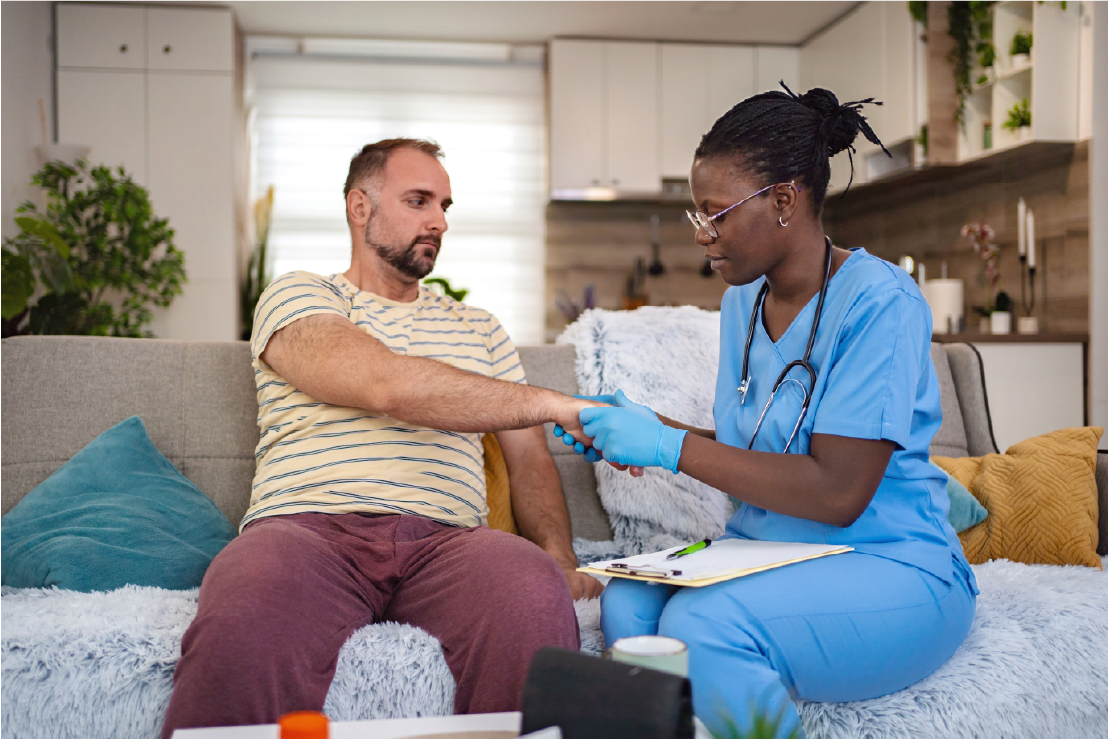 Elderly woman receiving compassionate care from a nurse at home